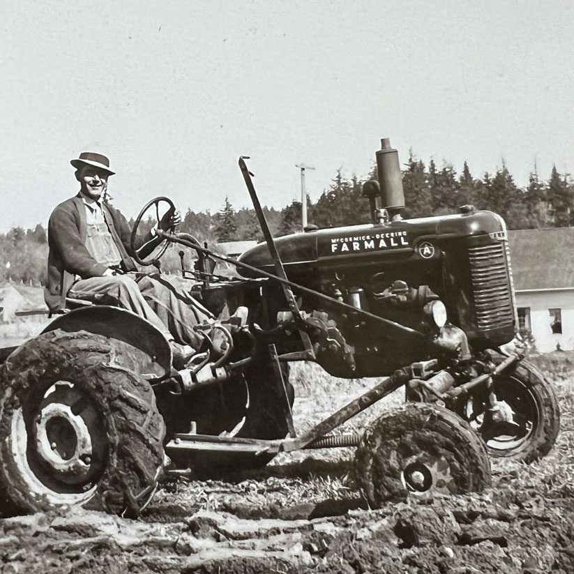 Joe's founder riding a tractor